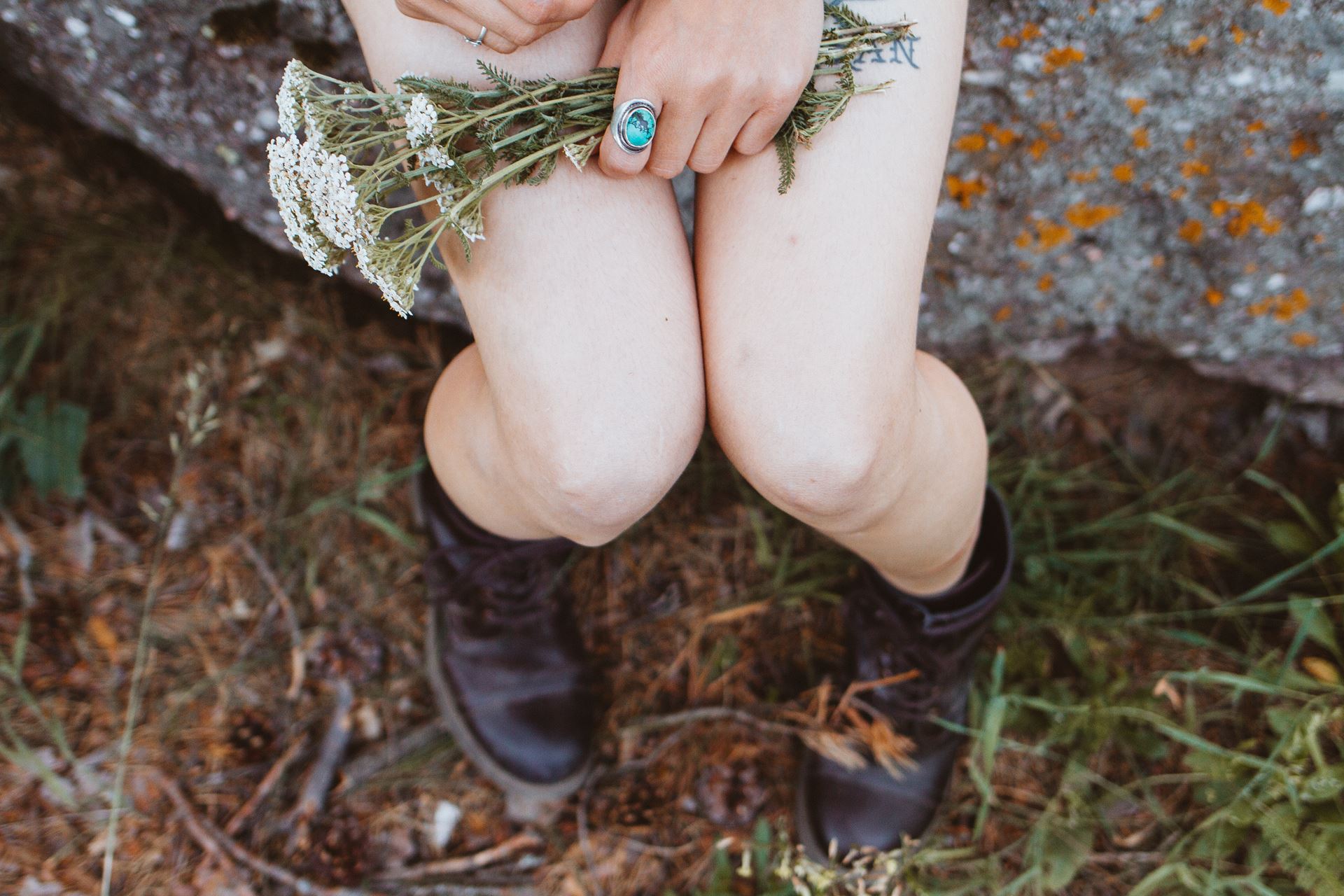 a person sitting on the grass