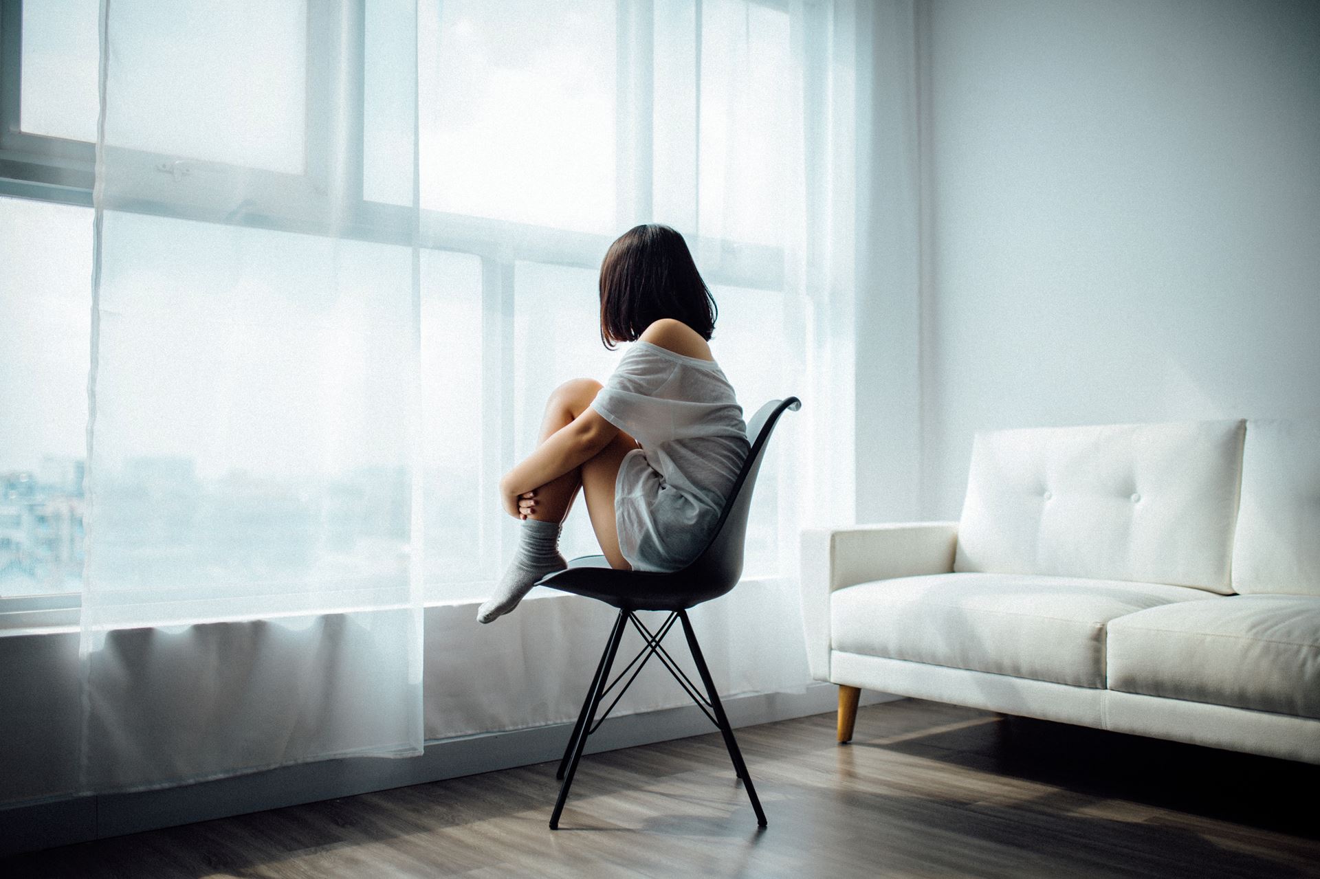 a person standing in front of a window